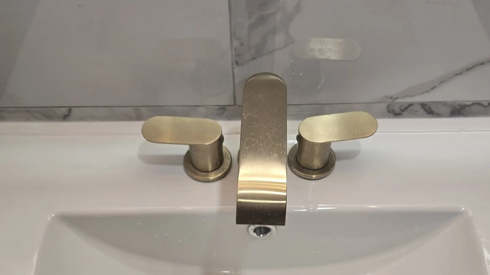 Plumber in Lynn, MA, close-up of a bathroom sink faucet
