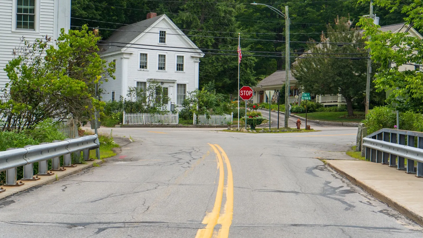 General contractor in Saugus, MA, a residential street with white New England houses